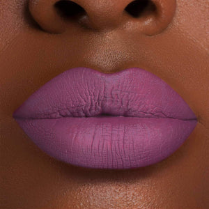 This organic matte lipstick, Party Girl, is the perfect addition to any makeup bag. With its vibrant purple hue, you'll stand out amongst the crowd. Formulated with 