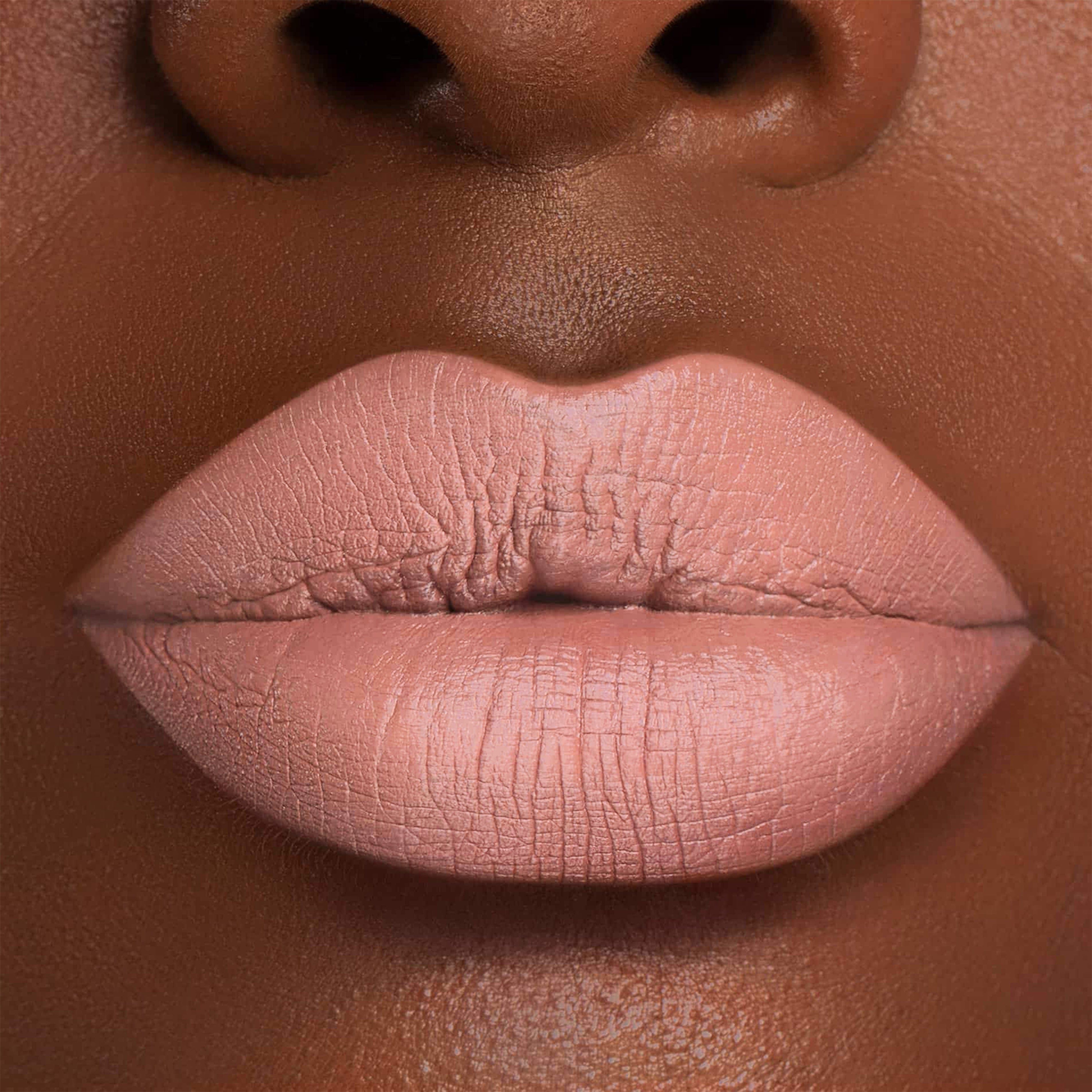 Miss Me is the perfect pale nude liquid lipstick for any skin tone. It's vegan- friendly and has a matte finish for a long-lasting look. Achieve a fantastic pout wit